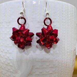 These are gorgeous red christmas bow earrings with plated Sterling Silver hooks